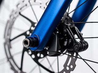 Road bike frame with disc brake mount detail.